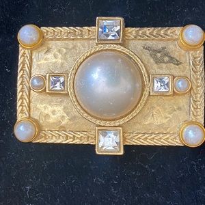 Costume gold tone rectangle brooch. It is 2 1/4”x 1 1/4”